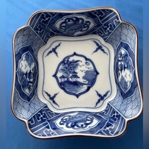 Vintage Andrea by Sadek dark blue and white floral bowl with geometric design.